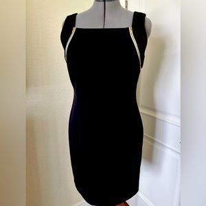 Calvin Klein sheath with zipper details at shoulder. Size 12. Black
